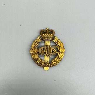 A 2nd Dragoon Guards (Queens Bays) regimental cap badge, die-stamped in brass.