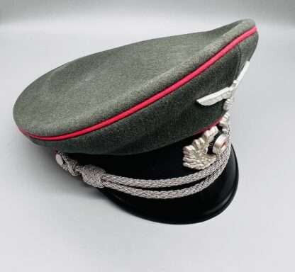A WW2 German Army (Heer) Panzer Officers Visor Cap with insignia.
