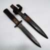 A WW1 German Close Combat Boot Knife By Gottlieb Hammesfahr, with scabbard.