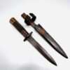 A WW1 German Close Combat Boot Knife By Gottlieb Hammesfahr, with scabbard.