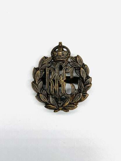 Original Royal Flying Corps cap badge constructed in bronze with RFC monogram surrounded by a laurel wreath and surmounted by a Kings crown.