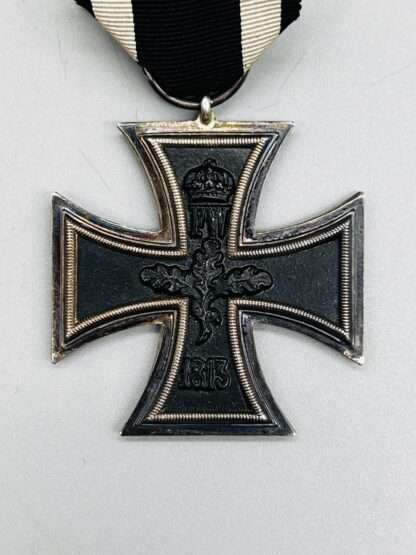 A WW1 Iron Cross 2nd Class 1914 By Heinrich Schneider with orginal ribbon