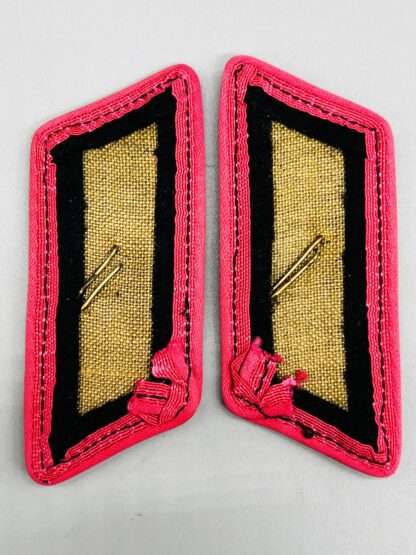 A reverse set of WW2 German Heer Panzer collar tabs, with pink rayon pipping.