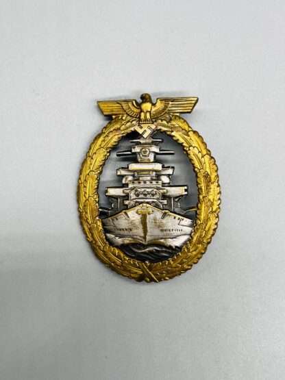 A WW2 Kriegsmarine High Seas Fleet Badge by Adolf Bock Ausf Schwerin with nice gilt finish.