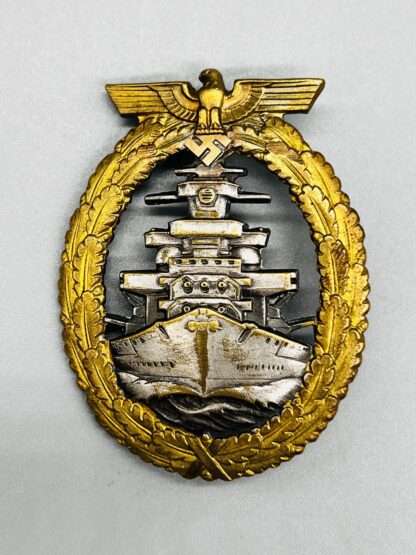 A WW2 Kriegsmarine High Seas Fleet Badge by Adolf Bock Ausf Schwerin with nice gilt finish.