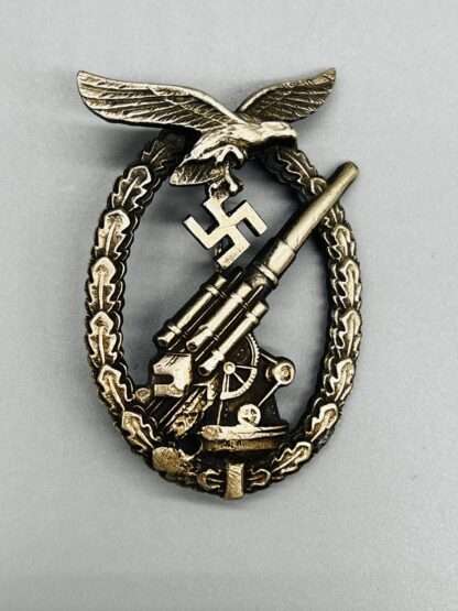 A WW2 Luftwaffe Flak Badge by Gustav Brehmer, constructed in tombak.