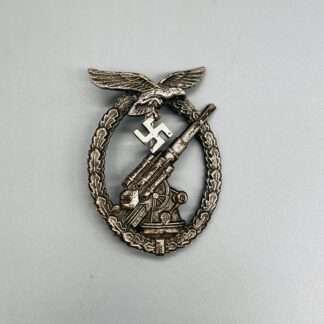 A early WW2 Luftwaffe Flak Badge By Gustav Brehmer, constructed in tombac with nice patina.