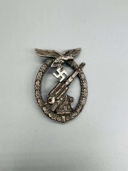 A early WW2 Luftwaffe Flak Badge By Gustav Brehmer, constructed in tombac with nice patina.