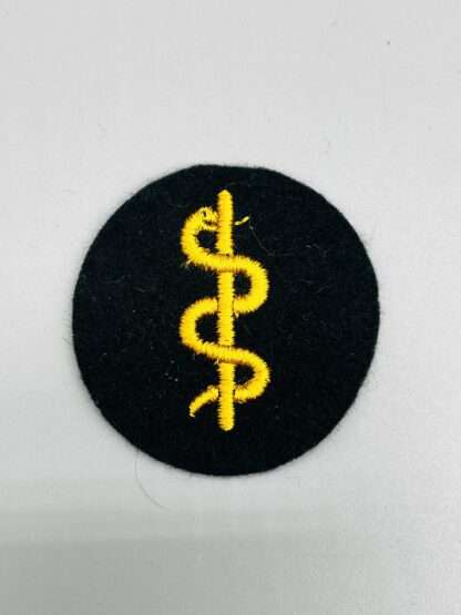 A WW2 German Heer Medical trade badge, machine embroidered in golden yellow thread.