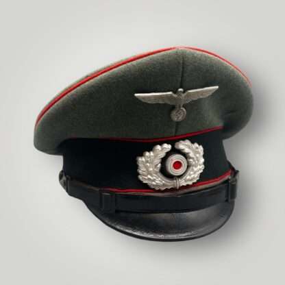 A WW2 German Heer Flak EM/NCOs visor cap with makers mark.