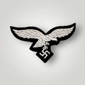 A WW2 Luftwaffe EM/NCO's Herman Göring Panzer-Division breast eagle, machine embroidered.