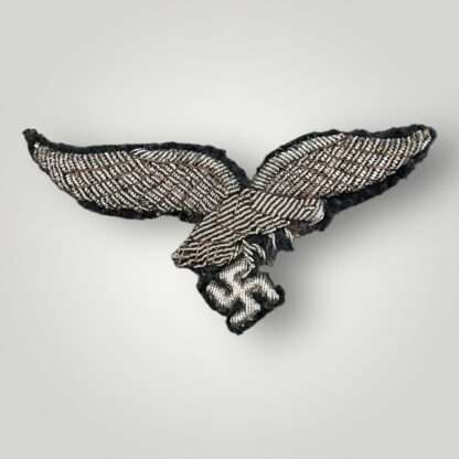 Original Luftwaffe Officer's bullion breast eagle, hand embroidered in silver bullion.