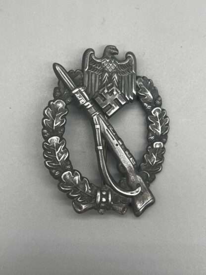 An original infantry assault badge in silver unmarked.