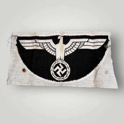 Reverse image of a WW2 German Army sports vest insignia, BeVo construction.