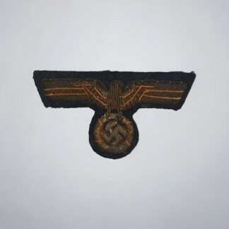 An original Kriegsmarine officer's bullion visor cap eagle.