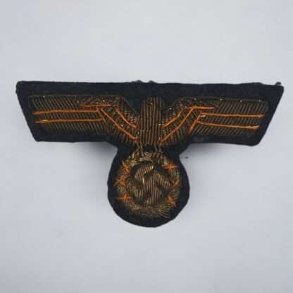 An original Kriegsmarine officer's bullion visor cap eagle, hand embroidered.