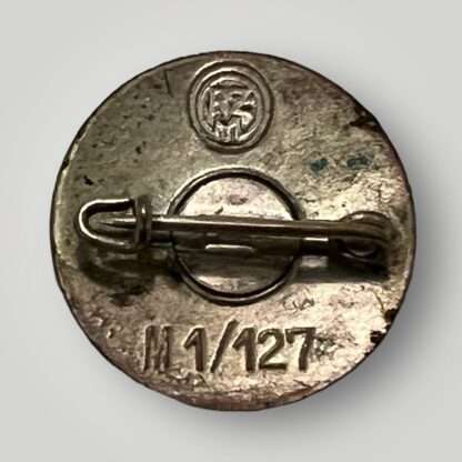 A reverse image of NSDAP Party Badge M1/127, constructed in enamel.