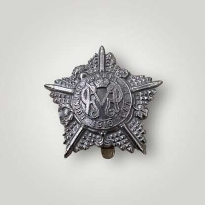 An original Guards Machine Gun Regiment WW1 cap badge, constructed in white metal.