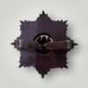 A revesre image of a WW2 Cheshire Regiment Officers WW2 cap badge.