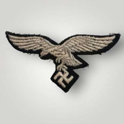 Reverse image of a WW2 Luftwaffe EM/NCOs breast eagle, machine embroidered.