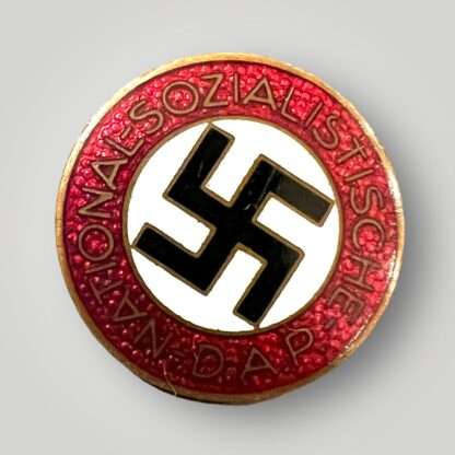 An original NSDAP Party Badge M1/151, constructed in enamel.
