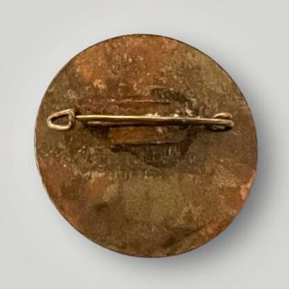 A reverse image of a Reichsparteitag Nuremberg Rally Badge 1934, die-struck contructed in steel.