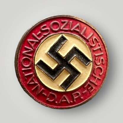 An original NSDAP party pin late war painted badge M1/148.