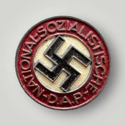 An original NSDAP party pin late war painted badge M1/102.
