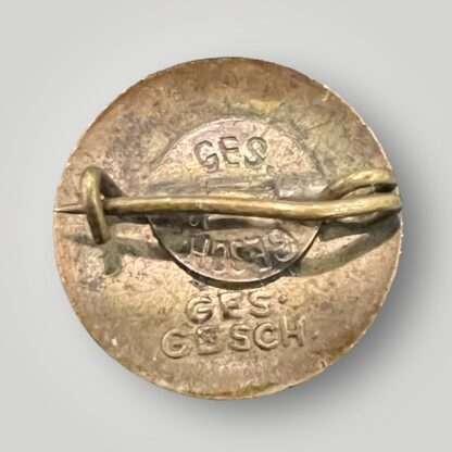 A reverse image of an extremly rare original German Faith Movement (Deutsche Glaubensbewegung) membership badge.