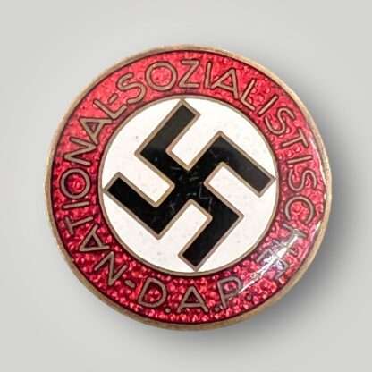 An original NSDAP party badge marked M1/153