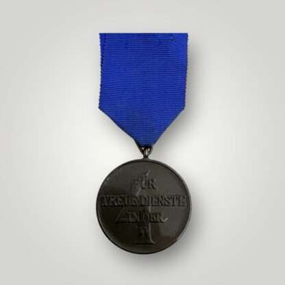 A SS service medal four years complete with original ribbon.