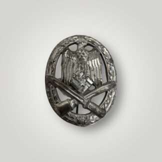 An orginal General Assault Badge by Rudolf Karneth, constructed in silvered zinc.