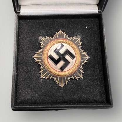 A WW2 German Cross in Gold by Zimmerman placed in the presentation case.