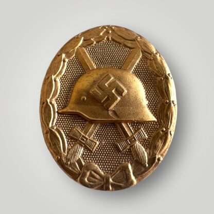 An original WW2 German Gold Wound badge tombak by Karl Wild, constructed in tombak.