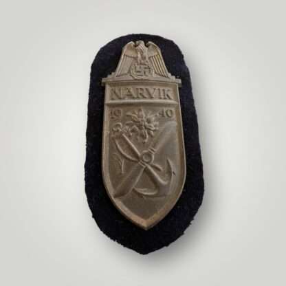 An original Kriegsmarine Narvik Shield, with dark blue backing cloth.