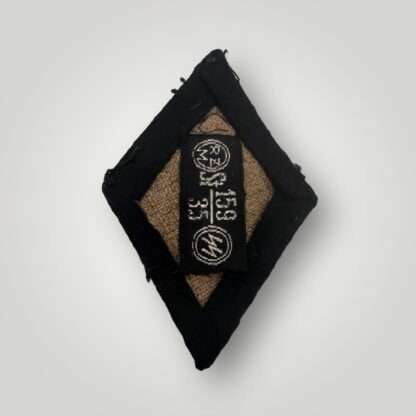 Reverse image of an SS medical services sleeve diamond, hand embroided with RZM tag.