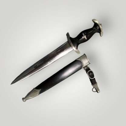 An early SS M33 Dagger By Böker with scabbard, and leather hanger.
