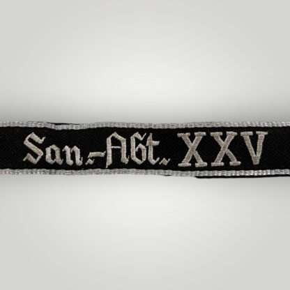 An original Waffen-SS San.-Abt.Ost cuff title, hand embroidered.