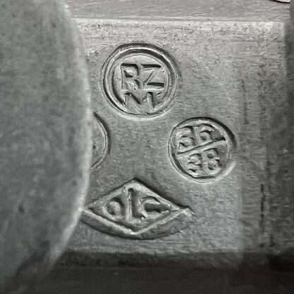 Reverse image of an original SS Waffen-SS officer’s belt buckle, stamped SS 36/38, OLC.
