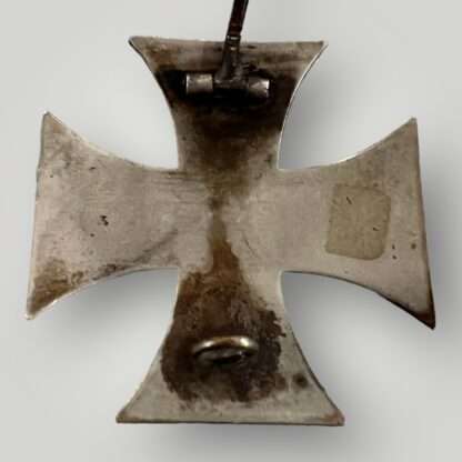 An original WW1 German Iron Cross 1st Class 1914 unmarked vaulted with barrel hinge and flat wire catch.