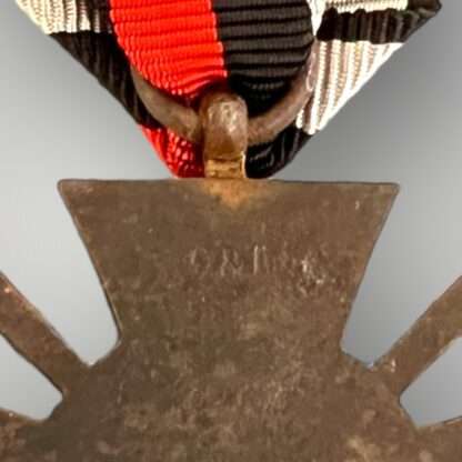 Reverse image of a WW1 German Honour Cross 1914 - 1918 marked O & B.