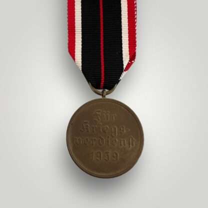 Reverse image of an orginal WW2 German War Merit Medal 1939.