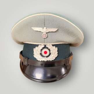 A WW2 German Heer EM/NCOs Infantry visor cap, with white pipping and green band.