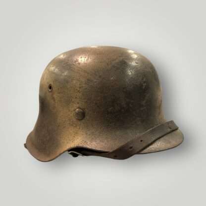 An original Luftwaffe M42 single decal Normandy camouflage helmet marked CKL66.