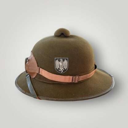 A WW2 German Heer (Army) Afrika Korp pith helmet 2nd pattern, with dust goggles and Heer metal decal.