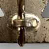 Reverse image of an original repetition clasp 1939 1st class catch, constructed in silvered tombak with nice patina.