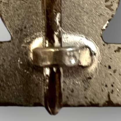 Reverse image of an original repetition clasp 1939 1st class catch, constructed in silvered tombak with nice patina.