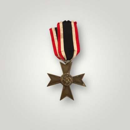 A War Merit Cross 2nd Class without swords and ribbon, constructed in tombac die-struck with a bronze wash.