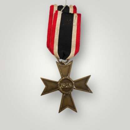 A War Merit Cross 2nd Class without swords and ribbon, constructed in tombac die-struck with a bronze wash.