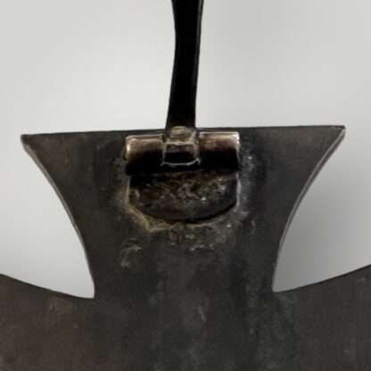 A close up image of the hinge of a Iron Cross 1st Class 1939 By Deschler & Sohn.